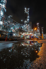 Oil​ refinery​ night plant and tower of Petrochemistry industry in oil​.