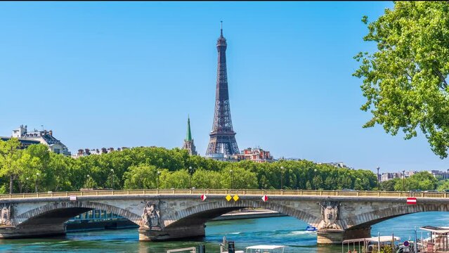 A timelapse of the Eiffel Tower along the river Seine with flyboats passing by with motion blur.Sunny but cloudy spring summer day paris city famous riverside bay tower view bridge timelapse panorama