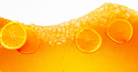 Close up shot of orange slices in refreshing summer drink. Tropical paradise. Textured photo....