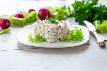 vegetable salad with boiled vegetables and dressed with mayonnaise