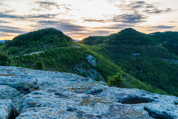 mountain landscape with sky and clouds during sunset