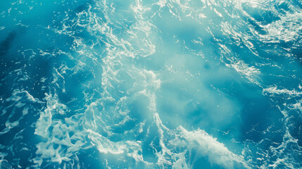 Fototapeta premium Top view of blue sea surface background