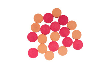 Handful of beige and red pills isolated on a transparent background