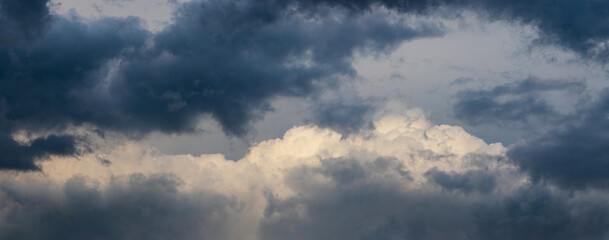 A threatening stormy sky with dark and light clouds