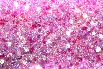 Close Up of Color Pink Shiny Confetti Glitter On White Background