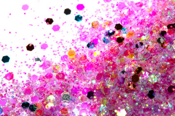 Close Up of Color Shiny Confetti Glitter On White Background