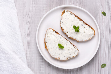Cottage cheese sandwiches decorated with mint