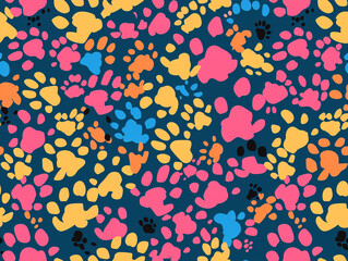 A colorful pattern of paw prints background. The paw prints are of different colors and sizes, creating a lively and playful atmosphere.