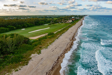 Aerial view of beautiful sandy beach and blue ocean waves, Delray Beach, Florida, United States.