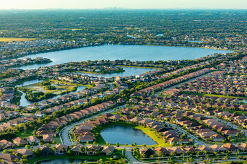 Aerial view of suburban neighborhood with residential houses and rooftops, Parkland, Florida, united states.