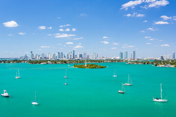 Aerial view of sandy beach and skyscrapers along Biscayne Bay, Monument Island, Miami Beach, Florida, United States.