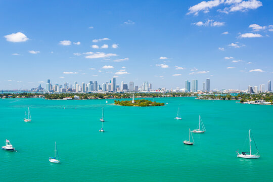 Aerial view of sandy beach and skyscrapers along Biscayne Bay, Monument Island, Miami Beach, Florida, United States.