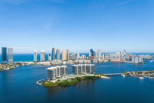 Aerial view of modern cityscape with beautiful water perspective, Pive Island, Aventura, Florida, United States.