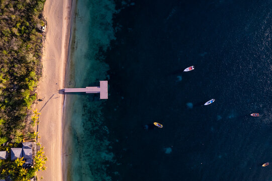 Aerial view of turquoise waters and sandy shore at Crocus Bay, Pelican Point, The Valley, Anguilla.