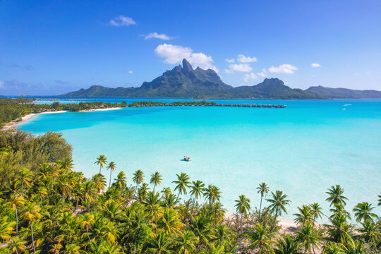 Aerial view of Bora Bora Lagoon with Mount Otemanu, Motu Vai Toto, French Polynesia.