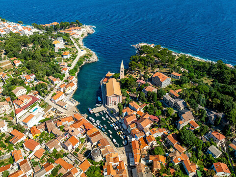 Aerial view of coastal town with beautiful sea shore, Mali Losinj, Croatia.