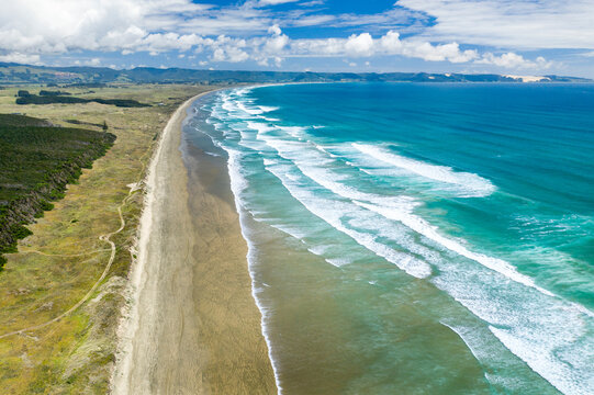 Aerial view of sandy beach along Ninety Mile Beach, Ahipara-Sweetwater, Northland, New Zealand.