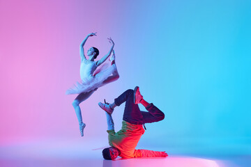 Harmony in Movement. Ballerina and street dancer making creative an impressive performance on...