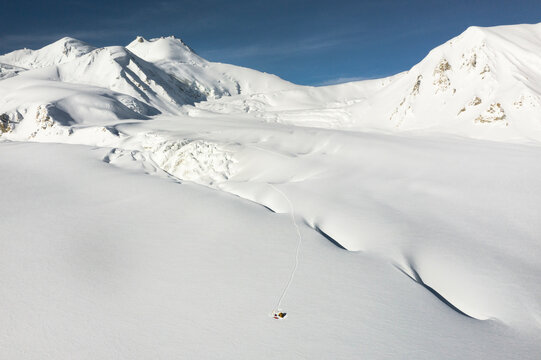 Aerial view of snow-covered Sim Gang glacier, camp site, Shigar, Gilgit-Baltistan, Pakistan.