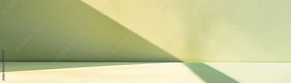 Poster abstract light pattern with green and yellow hues forming geometric shapes on a flat surface, creati