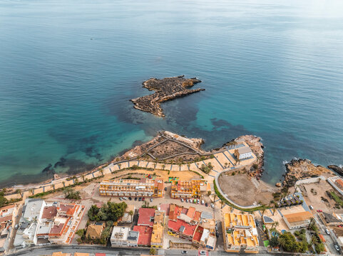 Aerial view of Isla Plana Island overlooking the Mediterranean Sea, Cartagena, Murcia, Spain.
