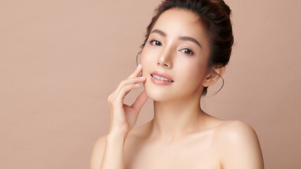 Beautiful young asian woman with clean fresh skin on beige background, Face care, Facial treatment,...