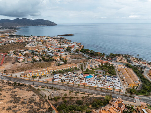 Aerial view of seaside town resorts, Isla Plana, Cartagena, Murcia, Spain.