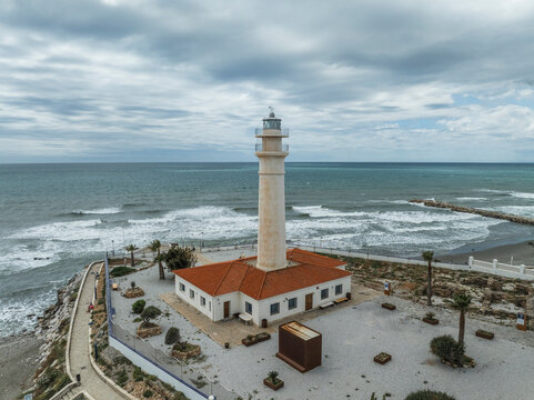 Aerial view of coastal town Torrox with Torrox lighthouse, Andalusia, Spain.
