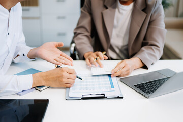business people and lawyers discussing contract papers sitting at the table. Concepts of law,...