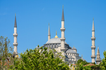 Majestic Blue Mosque on a Clear Day – Stunning View of Sultan Ahmed Mosque Against Blue Sky and...