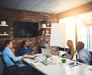 Meeting, whiteboard and presentation with graphs by woman, flare and boardroom. Planning, finance...