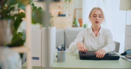 Overworked Businesswoman Closes Laptop