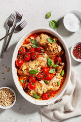 chicken legs backed with feta cheese tomatoes and pine nuts, healthy meal