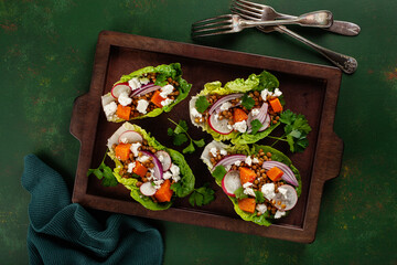 healthy sweet potato lettuce boats with radish, feta cheese, lentils