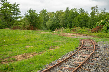 Fototapeta premium end of the line old and rusty railway, rehabilitated for tourism