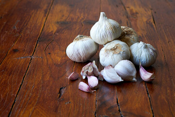 A Pile of Garlic on a Wooden Table