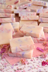 Wedding favor table with soaps for guest gifts original diy party souvenirs in pink purple white...