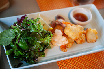 View of the fried shrimp and vegetable on the dish