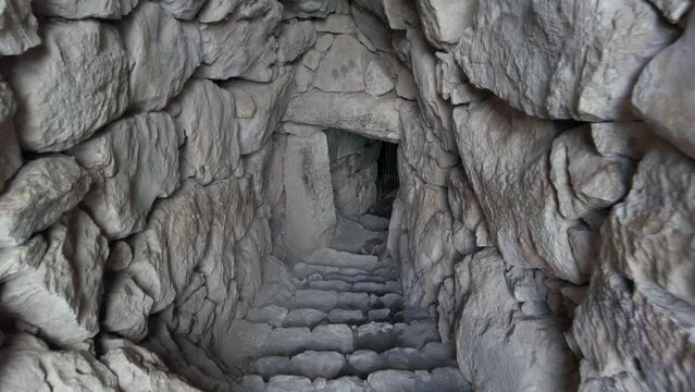 Archaeological site of ancient citadel of Mycenae , north-eastern Peloponnese, Greece - Greek settlement of the 12th century BC. e. with the ruins of the acropolis Agamennone / STONE  CAVE 