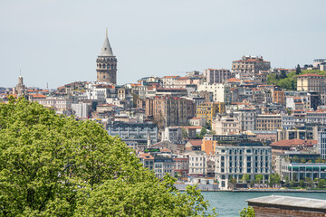 Fototapeta premium View from Topkapı Palace Overlooking the Historic Galata Tower and Vibrant Cityscape of Istanbul, Turkey
