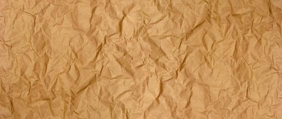 Crumpled brown kraft paper background