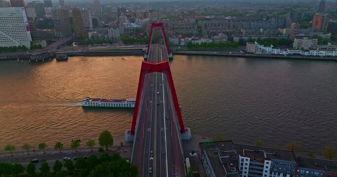Aerial view Rotterdam, Netherlands. Willemsbrug Bridge. Noordereiland Island. View of the city center. River Nieuwe Maas. Sunset