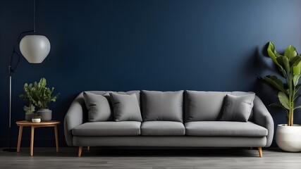 Gray sofa in a modern living room against a dark blue background.