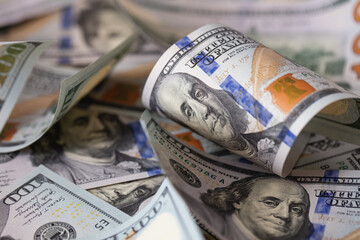 cuved U.S. 100 dollar banknotes background