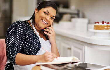 Phone call, book and woman writing recipes for baking cake with small business at home for...