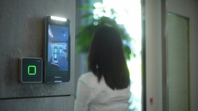 person using smart screen to unlock the door