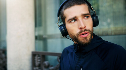 Music headphones, man or runner in city ready for workout, training or outdoor exercise with radio...
