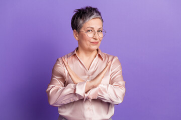 Photo portrait of nice pensioner female show stop gesture crossed hands wear trendy satin outfit...