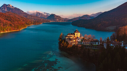 Fototapeta premium Aerial View of Schloss Fuschl on Fuschlsee in Autumn, Scenic Castle and Lake Landscape in Salzburg, Austria