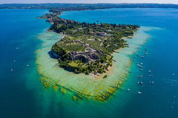 Aerial View of Sirmione Peninsula on Lake Garda, Scenic Historic Waterfront and Ruins in Italy